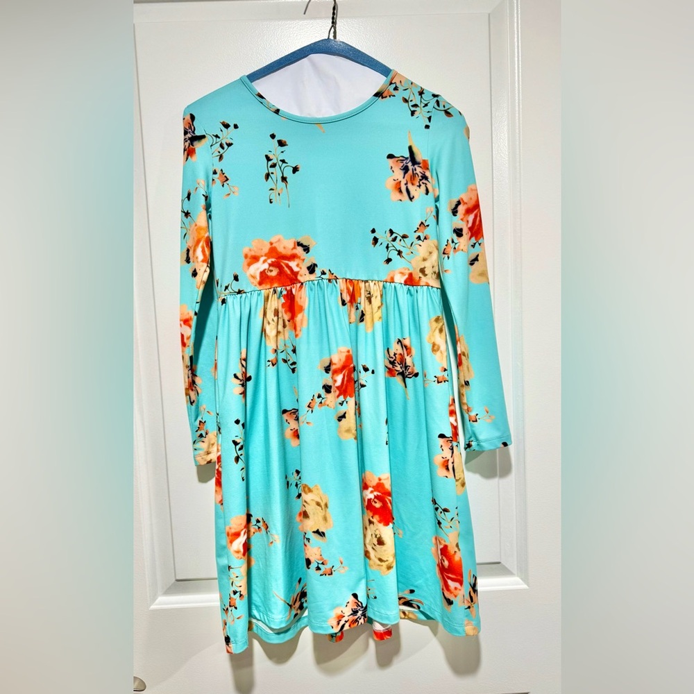 Girls long sleeve floral dress. Lightweight and flowy. Worn one time. Size XL